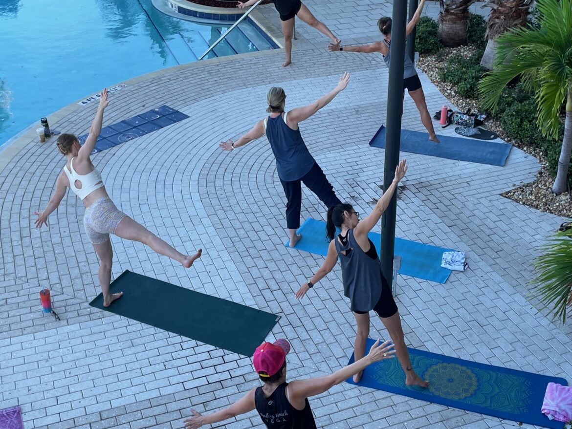 Poolside yoga stars
